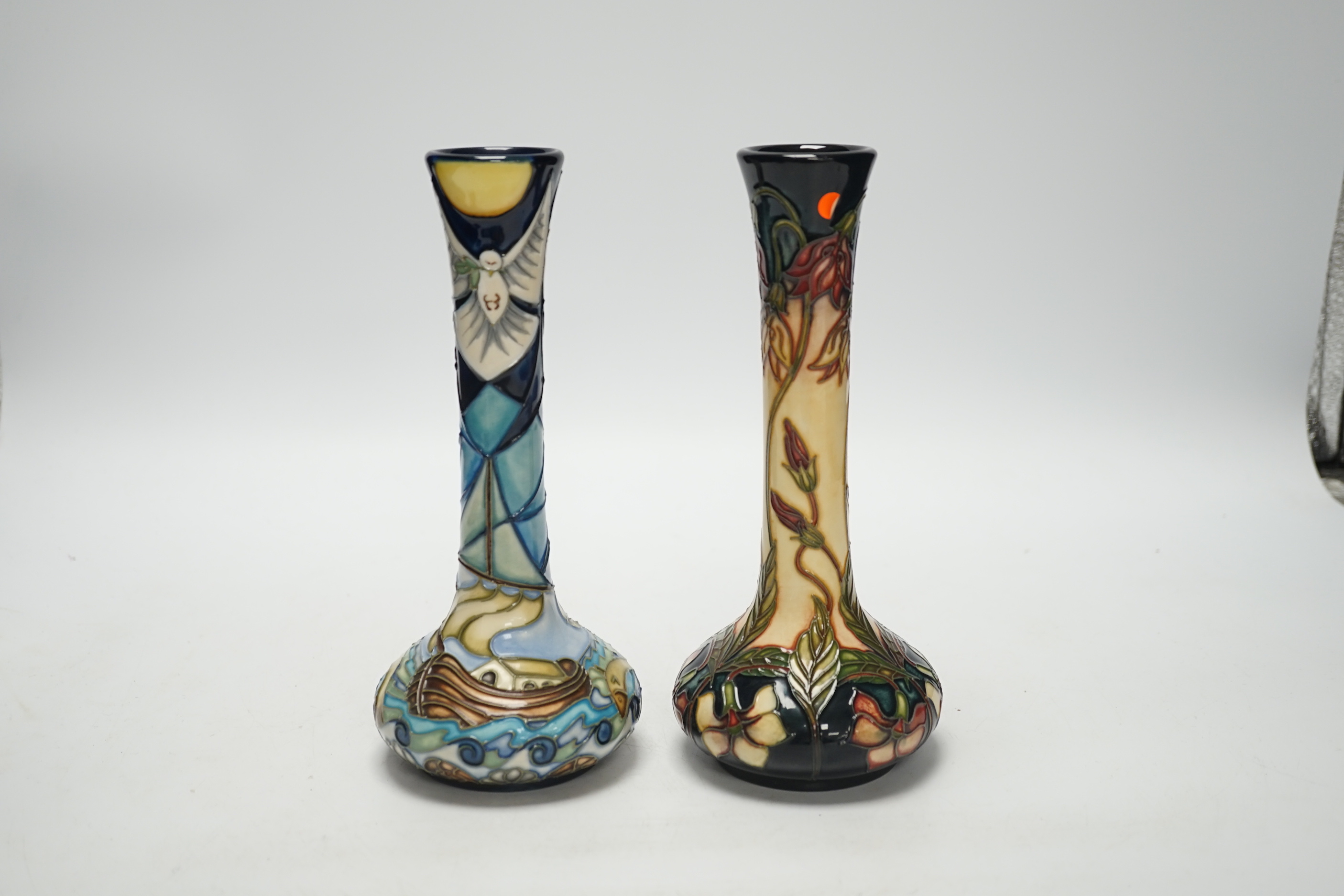 A Moorcroft ‘Winds of Change’ bottle vase, designed by Rachel Bishop, together with another vase by G Bishop, tallest 21cm